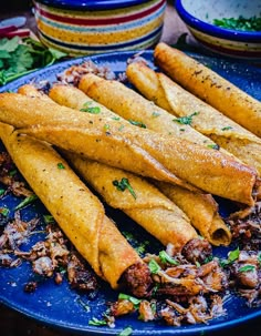 some very tasty looking food on a blue plate