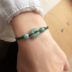 🍀 Bead Materials ：Real Jade 🍀 Rope colors：【Green/Red】-Other colors are available，Just give messages and tell me which color do you like. 🍀The dainty bracelet features a jade beads, which make a pretty bracelet for you. It could be a great gift for your friends and family, wishing them good luck and a happy long life. Casual Jade Beaded Bracelets Gift, Handmade Casual Jade Jewelry, Casual Jade Beaded Bracelet Gift, Casual Jade Jewelry As Gift, Casual Green Jade Jewelry, Casual Round Jade Jewelry, Casual Green Round Jewelry, Green Jade Bracelet, Lucky Gifts