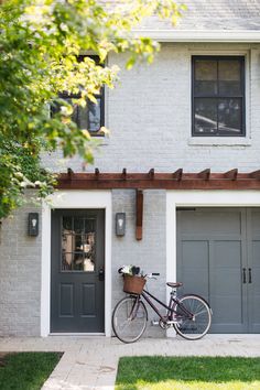 a bicycle is parked in front of a house