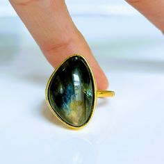 Retired 18k Yellow Gold Vermeil Labradorite Ring By Good Girls Revolt Sz7 1/2 Quite The Statement Piece. Absolutely Gorgeous Cocktail Ring With Large Ova L/ Tear Drop Shaped Labradorite. Each Stone Is Unique And Will Differ Slightly In Size, Shape, And Color. 18k Yellow Gold Vermeil Ring With A Lotus Shaped Labradorite Gemstone. Also Available In 18k White Gold Vermeil. Retail $228 - Like New Condition Handmade In California. Good Girls Revolt, Labradorite Ring, Cocktail Rings, Blue Gold, Gold Vermeil, Statement Pieces, Labradorite, Vintage Ladies, Vintage Jewelry