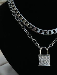 This Chained Elegance Necklace is perfect for making a statement. Its silver chained design has multiple layers that flow together seamlessly, creating an iconic look. Accessorize any outfit and turn any moment into a fashionable statement with this unique and elegant necklace. Elegant Necklace, Elegant Necklaces, Multi Layering, Silver Chain, Chain, Silver, Design