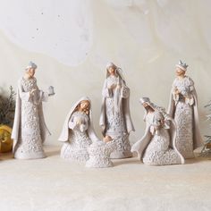 a group of figurines sitting on top of a table