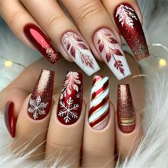 Christmas nail designs! Featuring long coffin-shaped nails with a glossy red base, delicate white snowflakes, candy cane stripes. #nails #nailsofinstagram#pressonnails #nailstagram #nailswag #nailsfordays #nailsonfleek Chic Acrylic Nails, Simple Xmas Nails, Candy Cane Nail Designs, Cute Xmas Nails, Christmas Coffin Nails, Stripes Nails, Xmas Aesthetic, Plaid Nail Art, Christmas Nail Ideas