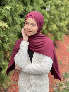 Our Modish Girl Premium Jersey hijab Burgundy is a high-quality, light-weight cotton jersey fabric. This luxurious Jersey wrap is the perfect complement to your daily look and a comfortable fit that will help make you feel stylish and confident. Fabric: Cotton, Lycra, Viscose Dimension: 54"x 16" Contour: Long Rectangle Thickness: Medium Texture: Smooth Care: Machine or hand wash in warm water, tumble dry or air dry, iron if needed.