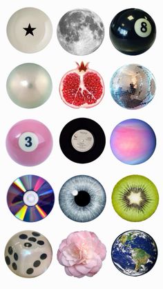 an assortment of pool balls with different designs and colors on them, including the eyeballs