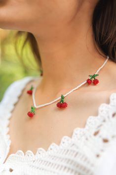 This cherry necklace is inspired by nature. You will be noticed thanks to this beaded jewelry, which has a magnificent style with cherry fruit beads. Embroidered with seed beads, this cherry necklace is a fruit jewelry. Green, white and red have never looked so harmonious. ➢All of my products are carefully handcrafted. ➢Bead sizes are 2 mm. ➢You can be sure that the seed beads I use and all my materials are of the highest quality. ➢The seed beads use never fade or lose their color.  FOR ALL BEAD Seed Bead Fruit, Beaded Fruit Necklace, Cherry Beaded Necklace, Beaded Cherry, Fruit Beads, Orange Statement Necklace, Fruit Aesthetic, Simple Beaded Necklaces, Cherry Charm