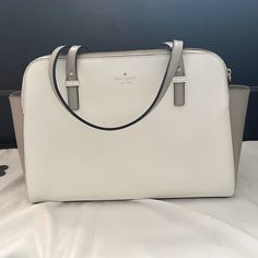 Kate Spade White Leather Tote Bag. Brand New Never Used. It Is White With A Cool Light Tan Color On The Sides. It Has Three Compartments, Two Zippered And One Buttoned. White Crossbody Office Bag, White Office Crossbody Bag, White Tote Bag For Office, White Office Tote Bag, Elegant White Satchel For Everyday Use, Office White Tote Bag, Classic White Satchel With Leather Handles, Classic White Shoulder Bag With Leather Handles, Chic White Satchel With Leather Handles