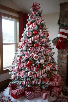 a christmas tree decorated with red and white candy canes