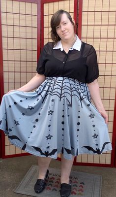 Mid-calf length goth skirt in various shades of gray with black bats, stars and spiderwebs. Very flowing and elegant, this full circle skirt is sure to impress! It has a deep pocket on either seam that can fit a large phone or wallet.  Material is a 90% polyester, 10% spandex blend. This skirt has a weave with a more matte texture, differentiating it from the shinier fabric of our skater skirts.  ~SIZING INFORMATION~ Sizing Chart and Example Sizing photos available at my studio's site here: http Witchy Skirt For Costume Party, Witchy Skirt For Halloween Cosplay, Fat Goth, Halloween Street, Goth Skirt, Skater Skirts, Goth Halloween, Comfortable Skirts, Mid Calf Skirt