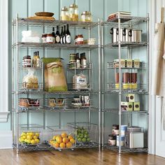 the shelves are filled with different types of food and drinks on them in this room