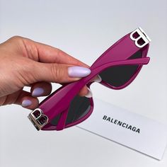 Balenciaga Bb0095s 017 Sunglasses Fuchsia Pink Silver Logo Grey Cat Eye Unisex Brand: Balenciaga Model: Bb0095s Color Code: 017 Gender: Unisex Year: 2023 Frame Colour: Fuchsia Pink Silver Logo Frame Shape: Cat Eye / Oval Frame Style: Full Rim Frame Material: Recycled Acetate Lens Material: Nylon Lens Color: Grey Lens Protection: Category 3 Size: 53x19x135 100% Uv Protection Made In Italy. Full Retail Package With All Accessories: Case, Cloth And All Paperwork. 100% Authentic! Designer Purple Sunglasses With Tinted Lenses, Designer Purple Sunglasses With Gradient Lenses, Designer Purple Tinted Sunglasses, Luxury Purple Sunglasses For Summer, Elegant Purple Cat Eye Sunglasses, Luxury Purple Sunglasses With Gradient Lenses, Luxury Purple Tinted Sunglasses, Trendy Purple Cat Eye Sunglasses With Mirrored Lenses, Trendy Purple Cat Eye Sunglasses With Uv Protection