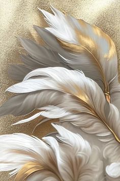 an artistic painting of white feathers on gold foiled paper with glittery edges and golden background