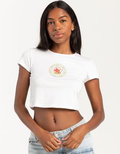 Obey Rose Studios Fitted Crop Tee. Graphic Screened At Center Chest. Crewneck. Short Sleeve. Fitted Silhouette And Cropped Length. 100% Cotton. Machine Wash. Imported. Model Is Wearing A Size Small. Model Measurements:height: 5'7" Bust: 32"waist: 23"hips: 32" White Cotton T-shirt With Rose Print, Short Sleeve Rose Print Tops For Summer, Short Sleeve Rose Print Graphic Tee Tops, Cotton Graphic Tee With Rose Print, Cotton Crew Neck Top With Rose Print, Fitted Cotton Top With Rose Print, Casual Cotton T-shirt With Rose Print, Trendy Rose Print T-shirt For Spring, White Cotton Top With Rose Print