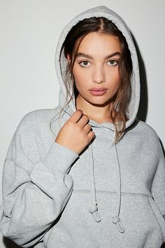 Updated Out From Under pullover hoodie in a boxy & cropped fit. Designed in a super-soft brushed knit featuring a crew neckline with hood & string details, front kanga pockets and a cinched bubble hem designed to be an elevated everyday basic. Exclusively at Urban Outfitters. Features Out From Under Try Me bubble hoodie sweatshirt Cropped pullover sweatshirt Soft & stretch brushed knit Crew neckline with hood & string details Drop shoulder long sleeves Front kanga pocket Cinched bubble hem Boxy, Oversized Cropped Sweatshirt With Drawstring Hood, Hooded Cropped Sweater For Fall, Hooded Cropped Sweater In Athleisure Style For Fall, Athleisure Hooded Cropped Sweater For Fall, Oversized Cropped Hoodie For Fall, Sporty Long Sleeve Cropped Sweater With Drawstring Hood, Winter Athleisure Cropped Sweater With Drawstring Hood, Fall Cropped Hooded Sweater In Athleisure Style, Sporty Boxy Fit Cropped Sweater For Fall