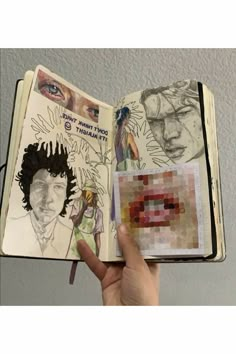 someone is holding an open book with drawings on it and the pages have been altered