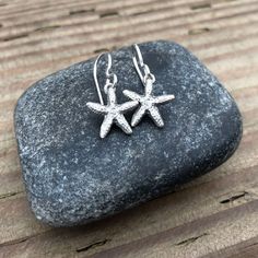 These Starfish earrings pair effortlessly with any outfit. From the beach to the office, these earrings add a little fun and a lot of elegance to any look. But they're more than just beautiful, Starfish hold deep symbolic meaning! Starfish signify spiritual truth and regeneration. They offer guidance, vigilance, inspiration, brilliance and intuition. Wear Starfish as a talisman for growth, rejuvenation and adaptability. 🍃 Feel the Wonder 🌳 We plant a tree for every piece sold #naturejewe Symbols Of Healing, Powerful Symbols, Starfish Earrings, Spiritual Truth, Silver Earrings Handmade