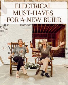 two women sitting on wooden chairs in front of a sign that says electrical must haves for a new build