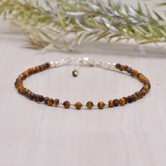 Tigers Eye Dainty Gemstone Bracelet, Tiny Brown & Yellow Gemstone Beads, Skinny Stacking Bracelet, Gold Fill or 925 Sterling Silver This bracelet is very dainty - beads measure about 2.5 mm apiece AAA Quality Please Feel Free To Contact If You Have Any Query. Orders are shipped within 1 business working day, excluding orders made on Sunday or national holidays. Domestic delivery takes 5-7 business days. International delivery takes 11-23 business days. PAYMENT METHOD : PayPal only Please send al Sterling Silver Crystal Bracelet With Round Gemstone Beads, Dainty Sterling Silver Bracelets With Gemstone Beads, Sterling Silver Beaded Bracelets With Natural Stones, Sterling Silver Gemstone Beaded Bracelets For Jewelry Making, Sterling Silver Spiritual Beaded Bracelets With Gemstones, Spiritual Sterling Silver Beaded Bracelets With Gemstone, Sterling Silver Crystal Bracelet For Jewelry Making, Sterling Silver Gemstone Beads Bracelet For Jewelry Making, Brown Silver Beaded Bracelet