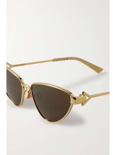 BOTTEGA VENETA EYEWEAR Cat-eye gold-tone sunglasses Gold Luxury Sunglasses For Evening, Luxury Gold Sunglasses For Evening, Elegant Gold Sunglasses For Formal Occasions, Designer Gold Sunglasses For Formal Occasions, Bottega Veneta Sunglasses, Eyewear Womens, Cat Eye Frames, Gold Sunglasses, Gold Tone Metal