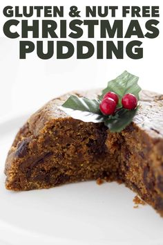 a close up of a piece of cake on a plate with the words gluten and nut free christmas pudding