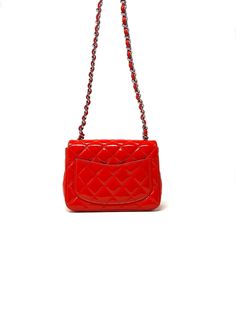 Chanel Mini Square Flap Bag in red vernice leather and silver hardware. This bag is in excellent condition. Used real 5 times. Comes with box, dustbag, ID card Chanel. Measurements: 17 x 13 x 7 cm Hologram: 19xxxxxx Year: 2015 Excellent as a gift. Elegant Red Bag With Glossy Finish, Red Leather Bags With Glossy Finish, Classic Red Shoulder Bag As Gift, Classic Red Shoulder Bag For Gift, Classic Red Bag With Glossy Finish, Formal Red Bag With Glossy Finish, Formal Red Bags With Glossy Finish, Red Glossy Formal Bags, Chanel Mini Square