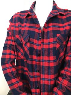 Red and navy flannel button up. Nice thick flannel! Vintage looking, made by Old Navy. Size small. Red Collared Flannel Shirt For Fall, Red Winter Flannel Shirt With Pockets, Red Flannel Shirt With Button Closure, Red Flannel Shirt With Buttons, Winter Collared Flannel Shirt With Snap Buttons, Classic Red Flannel Shirt For Fall, Winter Plaid Flannel Shirt With Buttons, Winter Plaid Flannel Shirt, Red Collared Flannel Shirt With Buttons