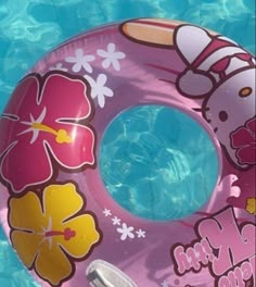 an inflatable swimming ring with flowers on it