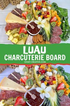 a platter filled with fruit and cheese on top of a white wooden table next to a green sign that says luau char