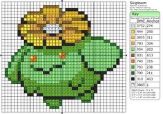 an image of a cross stitch pattern with a green flower on the front and side