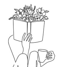 a person holding a book over their head with flowers in it