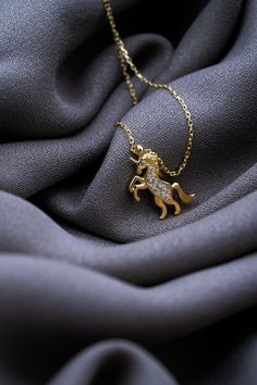 Unicorn Horse Gold Necklace Unicorn Horses are very noble animals, we combined this noble animal with gold and designed a necklace, you can easily wear this 14-karat gold necklace to any combination. Add a stylish gold necklace that you can buy to your loved ones to your cart without thinking and see the sparkle in your loved one's eyes. MATERIAL : 14K Gold. WEIGHT : 2,04 Grams COLORS : Gold - White - Rose Gold Each item is made to order. It is definitely not gold plated. Real 100% 14K Gold. The Elegant Necklace With Horse Design As A Gift, Elegant Horse Design Necklace As Gift, Gold Horse Design Pendant Necklace, Gold Pendant Necklace With Horse Design, Horse Design Pendant Necklace As Gift, Horse Design Pendant Jewelry Gift, Unicorn Horse, Unicorn Necklace, Horse Jewelry