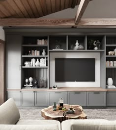 a living room filled with furniture and a flat screen tv mounted on a wall above a wooden coffee table