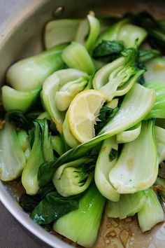 the vegetables are being cooked in the pan