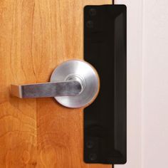 a door handle on a wooden door