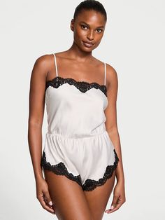 Silky satin and delicate lace give this one-piece a luxurious feel while gentle flutters at the legs add flirty movement. Adjustable straps High-cut leg Straight neckline Cotton gusset panel Partially made from recycled materials Machine wash Imported Luxury Sleeveless Intimates For Night Out, Luxury Sleeveless Intimates For Summer, Victoria Secrets Coconut, Lingerie Catalog, Rompers Online, Sun With Sunglasses, Womens Playsuits, Girl With Sunglasses, Straight Neckline