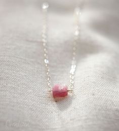 "Pink Tourmaline Necklace, Raw Crystal Pendant, October Birthstone Necklace Pink Tourmaline is believed to provide healing to matters of the heart and foster feelings of love, while creating joy and happiness. It aids in periods of transformation promoting a feeling of peace. Tourmaline is a birthstone for October, as well. This necklace is handcrafted with a small, raw crystal of Pink Tourmaline. Chains are available in sterling silver or 14kt gold fill. THE MATERIALS - Raw Pink Tourmaline - St Delicate Raw Stone Jewelry Gift, Delicate Raw Stone Jewelry For Gift, Pink Minimalist Birthstone Necklace, Dainty Tourmaline Necklace For Gift, Faceted Tourmaline Necklace Perfect As A Gift, Faceted Tourmaline Necklace For Gift, Moonstone Crystal Necklace, Pink Tourmaline Necklace, Raw Pink Tourmaline