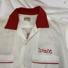 Hilton bowling button up shirt 1950s Size: Medium Chest-22” shoulder-6” sleeve-8” top to bottom-29” Retro White Button-up Camp Shirt, Retro White Short Sleeve Shirt With Camp Collar, White Retro Short Sleeve Shirt With Camp Collar, Vintage White Camp Shirt With Button Closure, Vintage White Shirt With Camp Collar, Vintage White Collared Camp Shirt, Retro Shirt With Camp Collar And Button Closure, Retro Camp Collar Shirt With Button Closure, Retro Shirt With Button Closure And Camp Collar