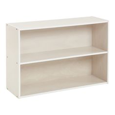 a white bookcase with two shelves on each side and one shelf above the other