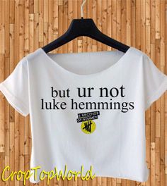 a t - shirt that says, but ur not luke hemmings on it