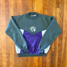 Dope Laguna crewneck from the '90s. Beautiful colorblock design with spellout/logo on front. Double side pockets. Has general wear and a couple pinholes by the collar but is in good condition otherwise. FTTS.  Brand: Laguna Size: M  Color: Gray, Purple, White Condition: Good College Crew Neck Patchwork Sweatshirt, Retro Color Block Sweatshirt For Streetwear, Retro Patchwork Sweatshirt For Streetwear, Fsu Shirts, Crewneck Streetwear, Vintage Crewneck, Vintage Florida, Champion Reverse Weave, Refashion Clothes