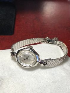 Excellent working and very good cosmetic condition. Comes with a white gold filled top and stainless steel bottom band. Fits a 5 3/4 inch wrist. Case size measures 16mm. 90 day money back guarantee, no questions asked, and 2-year warranty on our service. Band Fits, Top Band, Ladies Watch, Wrist Watches, Bracelet Watch, Womens Watches, Gold Filled, Wrist Watch, 4 Inch