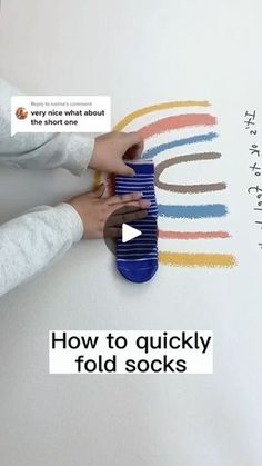 a woman is holding a blue cup in front of a white background with the words how to quickly fold socks on it