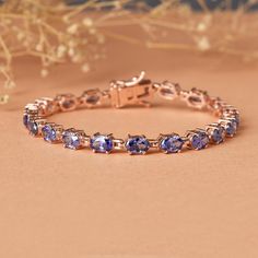 Luxury Tanzanite Tennis Bracelet - Sterling Silver, December Birthstone Jewelry, Sparkling Line Bracelet, Gift for Her Add a touch of elegance and brilliance to your jewelry collection with this stunning Tanzanite Tennis Bracelet. Featuring vibrant, deep blue-violet Tanzanite gemstones meticulously set in a sleek, high-quality sterling silver line, this bracelet exudes sophistication and timeless charm. Perfect for both everyday wear and special occasions, this bracelet shines with a luxurious sparkle. Key Features: Tanzanite Gemstones: Each stone is carefully selected for its rich, eye-catching hue, known for its unique color-shifting properties. Sterling Silver Setting: Crafted from premium 925 sterling silver, ensuring durability and a lustrous shine. Tennis Bracelet Design: A classic, Luxury Silver Tanzanite Bracelets, Luxury Tanzanite Bracelets Gift, Tanzanite Bracelet, December Birthstone Jewelry, Tanzanite Gemstone, Silver Line, Birthstone Gifts, Blue Violet, December Birthstone