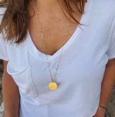 This large 14k gold fill or sterling silver necklace is perfect for layering! The 25mm charm is hammered to give a fun effect, and catch the light. It is paired with our flashy gold flattened chain to add even more sparkle! Shown here in 30 inch lengths. *If you are unsure of the length you need, or would like to wear this item at different lengths, we now offer an adjustable length option! You can add an adjustable end to your necklace using this link: https://www.etsy.com/listing/791277751/nec Everyday Gold Sterling Silver Coin Necklace, Everyday Gold Coin Necklace In Sterling Silver, Delicate Everyday Coin Pendant Jewelry, Everyday Delicate Coin Pendant Jewelry, Minimalist 14k Gold-filled Medallion Necklace, Minimalist 14k Gold Filled Medallion Necklace, Everyday Yellow Gold Jewelry With Large Pendant, Everyday Yellow Gold Necklace With Large Pendant, Everyday 14k Gold Filled Coin Pendant Jewelry