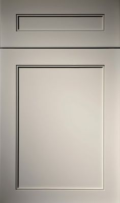 an image of a kitchen cabinet door that is white and silver in color with black trim