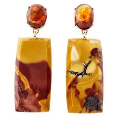 Natural Jasper Sphalerite yellow gold dangle earrings. 2 oval cabochon Sphalerite tops with 2 rectangular jasper dangles. Created in Peter Suchy Workshop. 2 oval cabochon natural Sphalerite, approx. total weight 7.80cts 2 rectangular Jasper, approx. total weight 38.15cts 14k yellow gold Tested and stamped: 14k 10.6 grams Top to bottom: 42.33mm or 1.67 inches Width: 14.06mm or .55 inch Depth: 6.28mm Gold Oval Earrings, Earrings Multiple, Vintage Designer Jewelry, Bling Earrings, Gold Dangle Earrings, Cabochon Jewelry, Oval Earring, Plastic Jewelry, White Gold Earrings