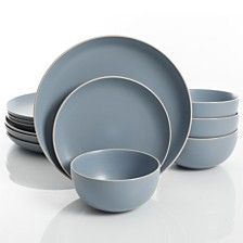 a set of grey dinnerware on a white background