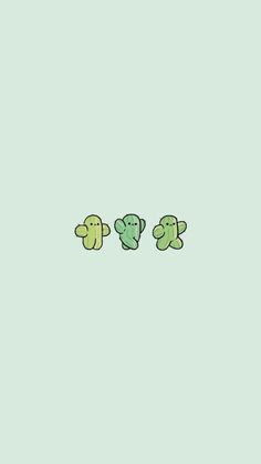 three little green teddy bears sitting next to each other on a light blue wallpaper