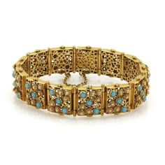 "This beautiful Retro bracelet is crafted from 18k yellow gold with a smooth polished finish. There are 13 rectangular shape links connected by long bar hinge, they are decorated with etruscan floral design and turquoise beads in bezel setting. This fine bracelet show a hallow inside with circle gallery stencil back and front. It secures with a push in clasp and chain attached for added security. Material: 18k yellow gold Measurements: 7.5\" x 0.66\" wide x 0.22\" high Gemstone: turquoise Weight Formal Turquoise Rectangular Jewelry, Luxury Rectangular Jewelry With Intricate Design, Etruscan Jewelry, Yurman Bracelet, Heirloom Rings, Retro Bracelet, Blue Topaz Bracelet, Green Sunglasses, Gold And Silver Bracelets