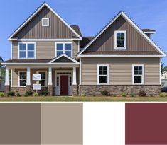 a house with brown siding and white trim